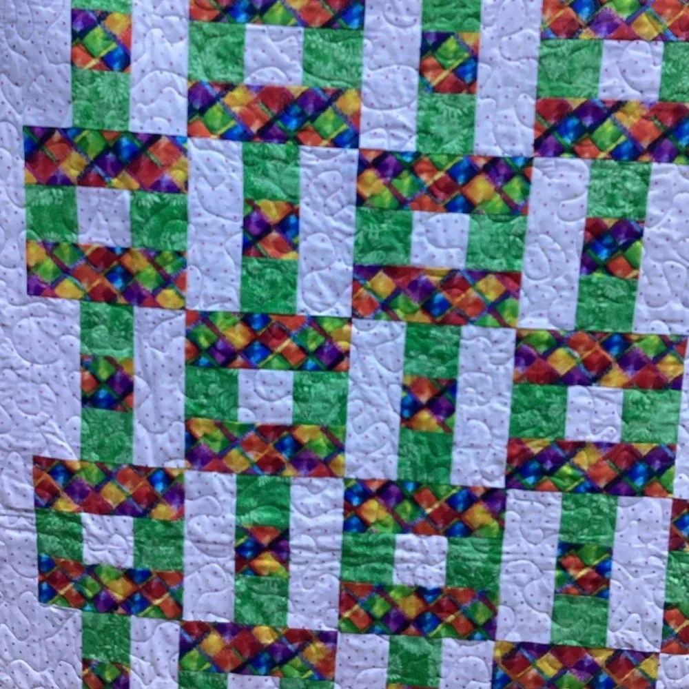 Handmade colorful lap quilt